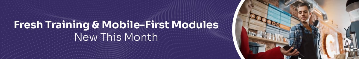 Text: Fresh Training and Mobile-First Modules New This Month; Image of a barista in a restaurant taking contactless payment from a mobile phone.